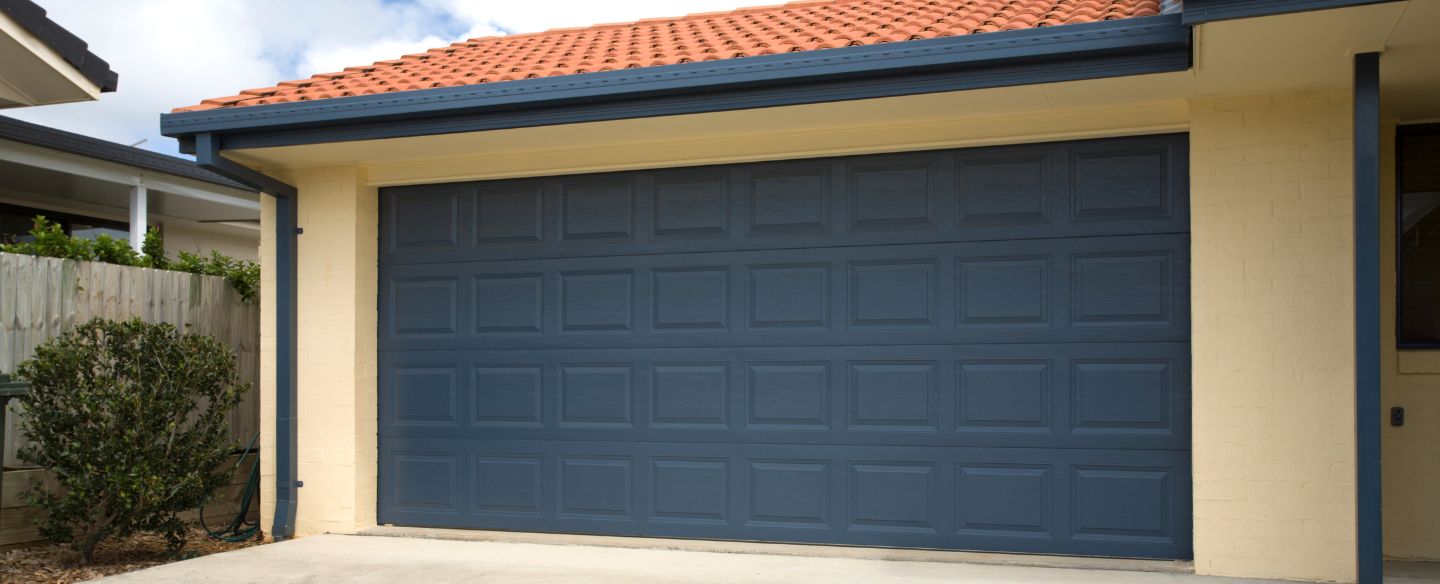 a blue garage door on a home paso robles ca