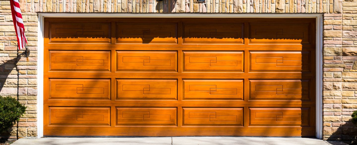 brown wooden garage door on residential paso robles ca